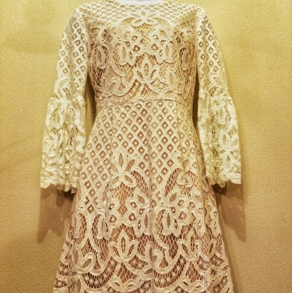 Bell sleeve fit and flare dress